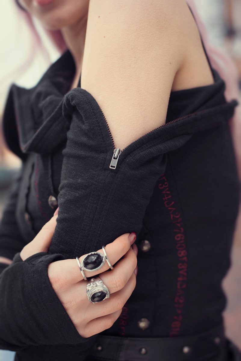 The small details: a zip at the sleeve, rings, stitching